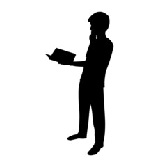 Silhouette of male kid reading a book while thinking