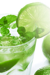 Mojito highball cocktail or refreshing drink with lime and mint