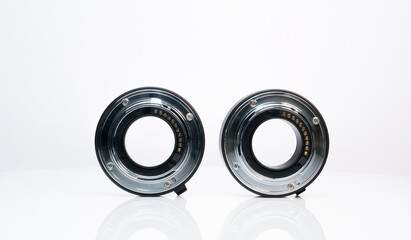 Two macro ring adapter for camera lens on a white background. Bayonet for camera
