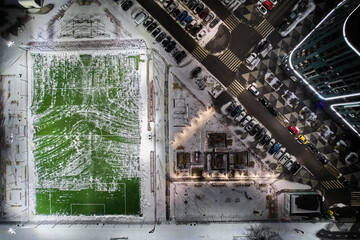 Football field in winter view from above.