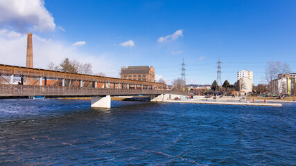 View of the area around the old factory Seifenfabrik at the shore of river Mur in the city of Graz, Austria