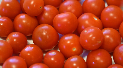 large dish of Cherry Tomatoes, local produce, plant based food, cooking ingredients 