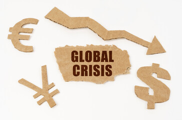 On a white background, currency symbols, an arrow and a cardboard box with the inscription - global crisis