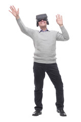 in full growth. smiling man in virtual reality glasses.