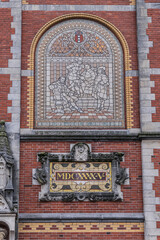 Architectural fragments of famous Rijksmuseum building (1885) in Amsterdam. Amsterdam Rijksmuseum holds many masterpiece paintings of Dutch and world art. Amsterdam, The Netherlands.