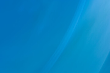 Abstract blue festive background. Slight blur, highlights and oblique lines. Backdrop.