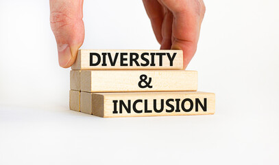 D and I, Diversity and inclusion symbol. Concept words D and I, diversity and inclusion on blocks on beautiful white table white background. Business, D and I, diversity and inclusion concept.