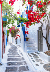 Charming typical floral streets of greek islands. Mykonos, Cyclades. popular summer tourist destination