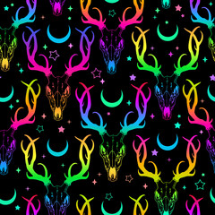 seamless pattern of bright deer skulls and stars