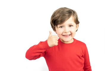 Happy boy on white background thumb up hand sign