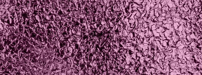 Banner pink golden crumpled shiny texture.