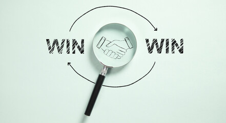Magnifying glass with the text TIME TO WIN