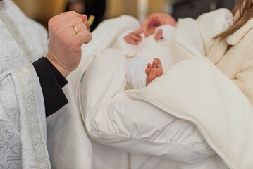 Baptism ceremony in Church. baptism of a child, the sacrament of baptism, Church, temple, Orthodoxy.