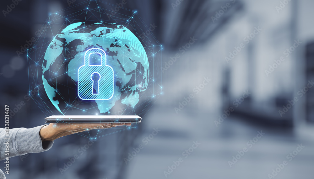 Poster close up of hand holding smartphone with abstract glowing globe hologram with security padlock icon 