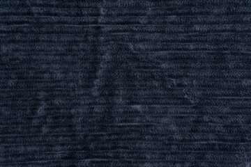 Navy blue fabric velvet texture close up