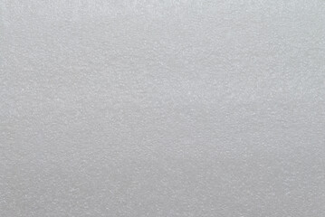 White EPE foam polyethylene packaging as background 