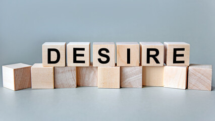 desire, the inscription on wooden cubes on a white background