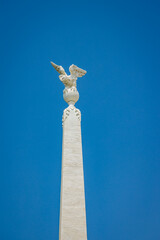 Eagle spreading its wings at the top of the column of the Fontaine des Precheurs fountain on the...