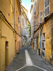 Fototapeta na wymiar Typical colorful old city street and buildings of Aix en Provence, France