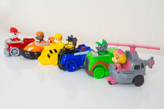 Minsk, Belarus - September 1, 2020: Paw patrol team in cars standing in a row. miniatures of heroes of the animated series. special equipment and cars
