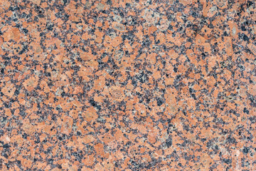 Close up, natural dark red granite marble texture.
