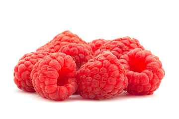 Ripe raspberry berries on white