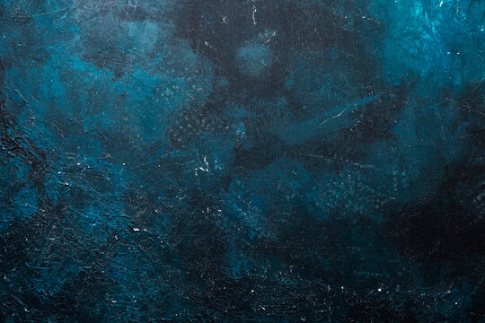 Blue old scratched painted texture or background with grain elements. High contrast and resolution image with place for text. Template for design