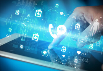 Close-up of a touchscreen with healthcare icons