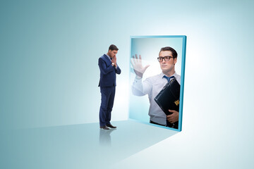 Young businessman in alter ego concept