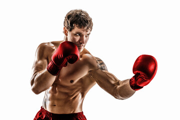 Fototapeta na wymiar Portrait of muscular boxer who training and practicing uppercut in red gloves on white background.