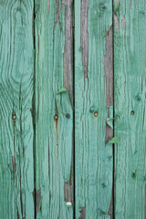 Boards with peeled old paint.