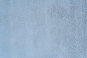 Close-up, texture of a gray facade made of decorative plaster.