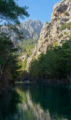 Fototapeta na wymiar autumn mountain landscape with shady lake
