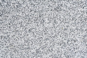 Close-up, texture, background of gray granite wall.