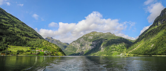 Naklejka na ściany i meble Water view of the beautiful landscapes of Geiranger fjord