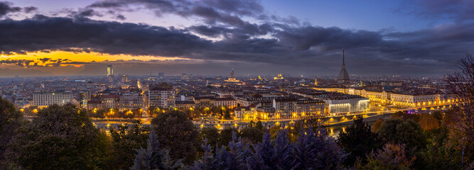 Beautiful breathtaking evening panoramic cityscape of the majestic famous ancient italian city of Turin - 483836403