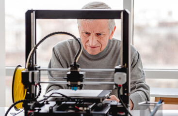 Man with 3D printer