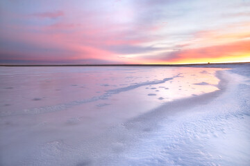 Soft Pink Morning Light on a Frozen Colorado Lake