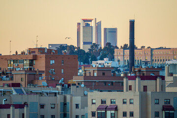 Fototapeta na wymiar Panoramic view of the city of Madrid during a sunset, roofs and skyline