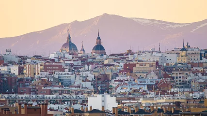 Fotobehang Panoramic view of the city of Madrid during a sunset, roofs and skyline © MARIO MONTERO ARROYO