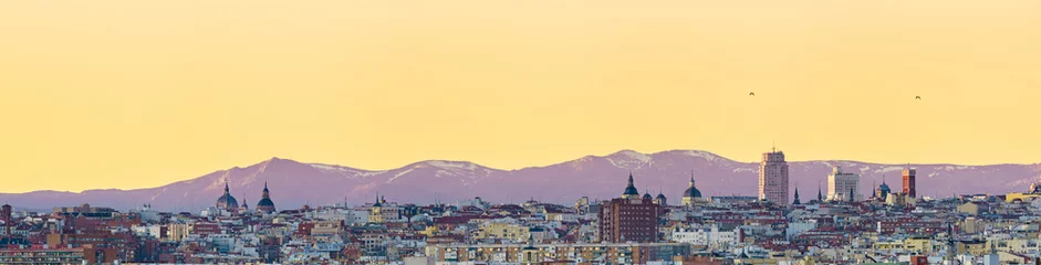 Fotobehang Panoramic view of the city of Madrid during a sunset, roofs and skyline © MARIO MONTERO ARROYO