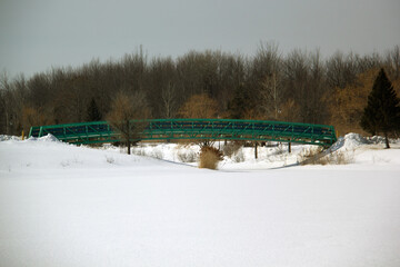 Fototapeta na wymiar Landscape with snow covered bridge