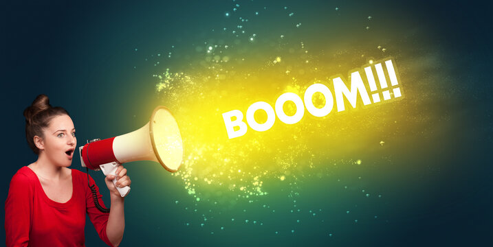 Young woman yelling to loudspeaker