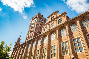 Fototapeta premium Torun, Poland - August 11, 2021. Gothic facade of Old Town Hall in Old Market square