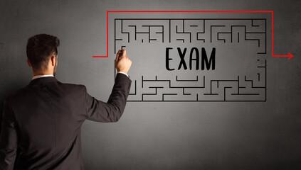 businessman drawing maze