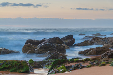 Soft sunrise seascape with clouds