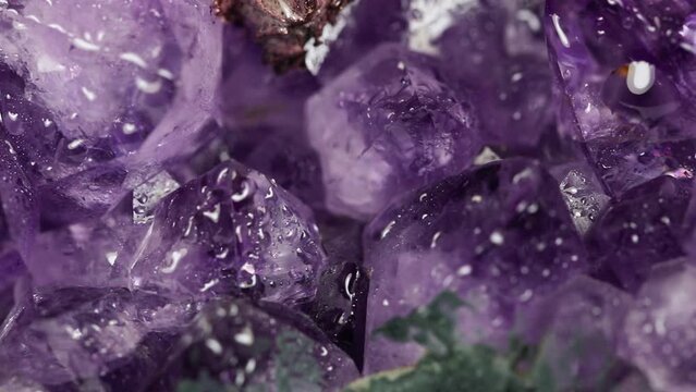 Macro purple texture and background with amethyst crystals.