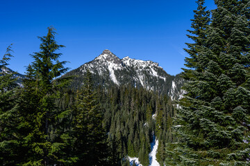Denny Mountain in the Alpine Lakes Wilderness on a clear blue sky sunny day, as a nature background
