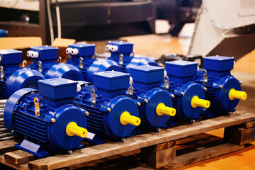 New blue electric motors in the factory for assembling