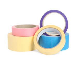 Many different rolls of adhesive tape on white background